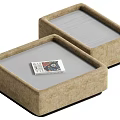 Two Square Beige Velvet Coffee Tables With a Card Placed on Top Surface 3d model