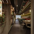 Chinese Family Feast Restaurant Interior With Wooden Dragon Carving Brick Wall Green Plant And Lantern