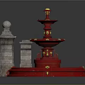 Red Multi Tiered Fountain With Stone Pillars And Ornate Gold Details