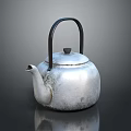 Vintage Silver Teapot With Black Handle And Reflective Surface As Household Electrical Appliance