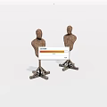 Two Burlap Covered Mannequin Torsos On Metal Stands With Simple Design