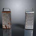 Rusted And Silver Metal Kitchen Graters As Practical Household Cooking Utensils