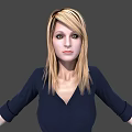 Woman with long blonde hair wearing dark blue V neck shirt against gray background