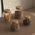 Glass Spice Jars with Cork Lids Containing Spices Beans and Pasta on Wooden Table