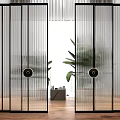 Modern Glass Room Divider With Vertical Stripes Black Frame Round Handles And Plants In Interior