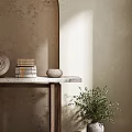 Console Table With Marble Top On Textured Wall Stacked Books Round Decor And Potted Plant
