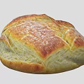 Freshly Baked Artisan Bread Loaf With Golden Crust And Soft Interior