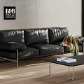 Modern Black Leather Sofa Coffee Table Set With Metal Legs And Colorful Throw Blanket