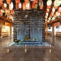 Chinese Style Shopping Mall Store Interior With Colorful Lanterns And Stone Waterfall