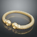 Elegant Shiny Gold Bracelet With Braided Texture And Animal Head Ends For Daily Wear