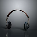 Ergonomic Computer Headphones with Wooden Headband Black Ear Cups Metal Frame and Gray Reflection