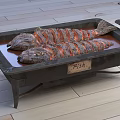Two Roasted Fish on Metal Tray With Handles and Sauce Labeled Fish on Wooden Floor