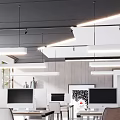Modern Public Office Space Interior Design With Desks Computers Chairs Plants And Bookshelves