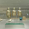 Modern Clothing Store Interior With Mannequins Display Racks And Window Advertisement