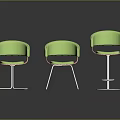Three Green Leisure Chairs With Modern Padded Seats Wooden Armrests And Metal Bases