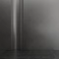 Modern Minimalist Gray Interior With Smooth Concrete Wall And Polished Floor