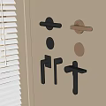 Modern Metal Door Handles in Various Styles Mounted on Beige Home Interior Wall