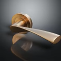 Smooth Golden Metal Door Handle With Reflective Finish On Dark Background