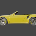Stylish Yellow Porsche Convertible Sports Car With Black Wheels And Sleek Front Design