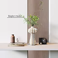 Modern Decorative Ornament Set With Vase Green Foliage Bottle Book Black Sphere On White Tabletop