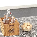 Decorative Ornament Set With Wooden Crate Glass Bottles Metal Wire Basket And Potatoes On Countertop