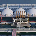 Aerial View of Large Ship at Port With White Spherical Tanks and Industrial Structures