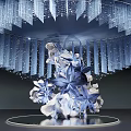 Illuminated Modern Art Installation With Circular Hanging Blue Transparent Elements And White Floral Sculpture