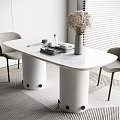 Modern Bar Counter With Marble Top Cylindrical Bases Gray Chairs Dried Flower Vase And Books
