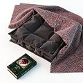 Everyday Living Items With Dark Cushion Woven Fabric And Green Cover Book
