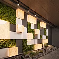 Illuminated Feature Wall With Green Moss White And Gray Square Panels And Decorative Stones