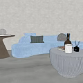 Modern Blue Curved Multi-Person Sofa With Coffee Table Side Table And Decorative Items 3d model