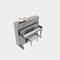 Black Upright Piano with Art Supplies on Top and Matching Piano Bench