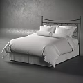 Double Bed with Black Metal Headboard White Striped Bedspread and Pillows in Modern Bedroom Setting
