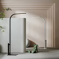Modern Home Interior Floor Lamp With Sleek Black Silver Design And Green Plant