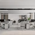 Modern Open Concept Public Office Area With White Desks Gray Chairs Large Windows Green Plants