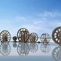 Wooden Garden Ornaments With Multiple Wheel Designs And Water Reflection In Blue Sky
