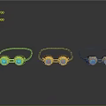 Three Gold Eyeglasses Adorned With Green Gemstones On Black Background Reflections