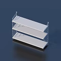 Three Tier White Metal Shelf With Railings On Dark Background And Reflection