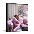 Portrait of Woman in Pink Fur Coat Sitting by Window on Sofa with Natural Light