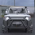 Silver And Black Off Road Car With Roof Rack Large Bumper And Off Road Tires