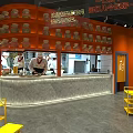Hotpot Restaurant Interior Featuring Orange Walls Display Jars Counter and Yellow Tables