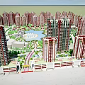 Modern Commercial Street With Red Glass High Rise Buildings And Parking Area