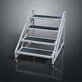Silver Metal Step Ladder With Four Dark Tread Steps And Wheels