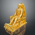 Golden Seated Figure Statue On Intricate Chair With Reflective Surface