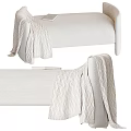 Cozy Beige Linen Upholstered Footstool With Draped Knitted Blanket And Book