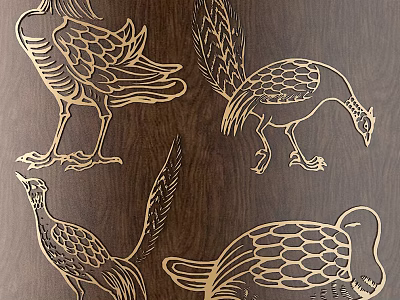 Golden Bird Carvings On Dark Wooden Surface With Intricate Feather Patterns 3d model