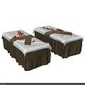Two Comfortable Massage Beds With White Brown Covers Red Petals And Towels
