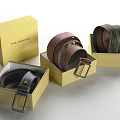 Leather Belts Packaged in Yellow Boxes with Various Colors and Metal Buckles