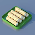 Creamy Ice Cream Filled Golden Wafer Rolls On Green Serving Tray