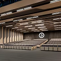 Large Modern Conference Room with Rows of Seats Ceiling Lighting and Central Logo Design